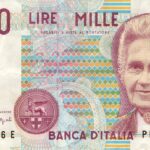 Moneta da 5 lire con simbolo distintivo, esposta su sfondo neutro, per valutazione collezionistica.
